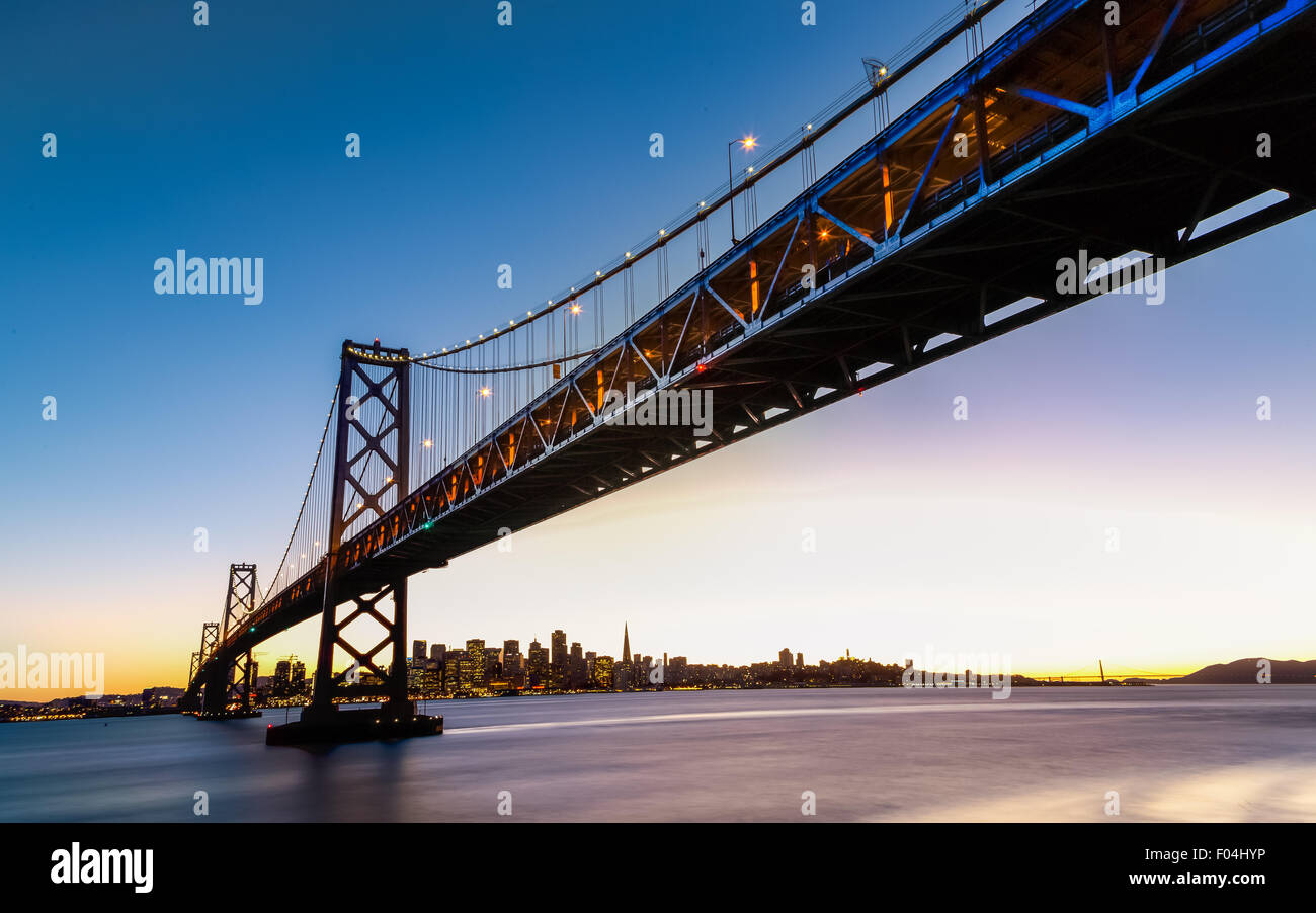 San Francisco-Oakland Bay Bridge and cityscape at sunset Stock Photo