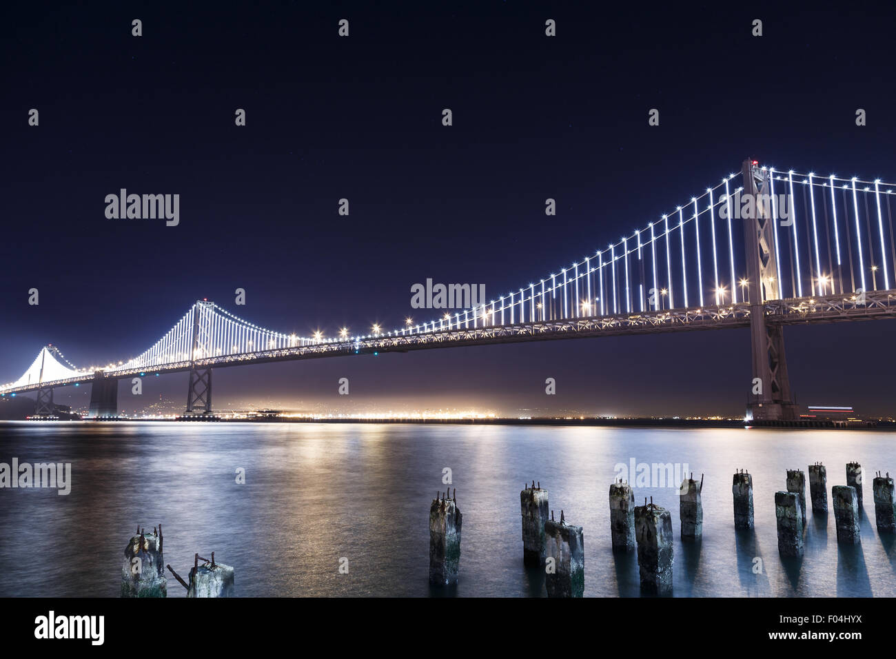 San Francisco-Oakland Bay Bridge illuminated at night Stock Photo