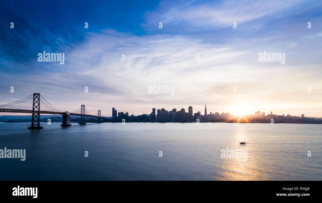 San Francisco skyline at sunset with dramatic clouds Stock Photo