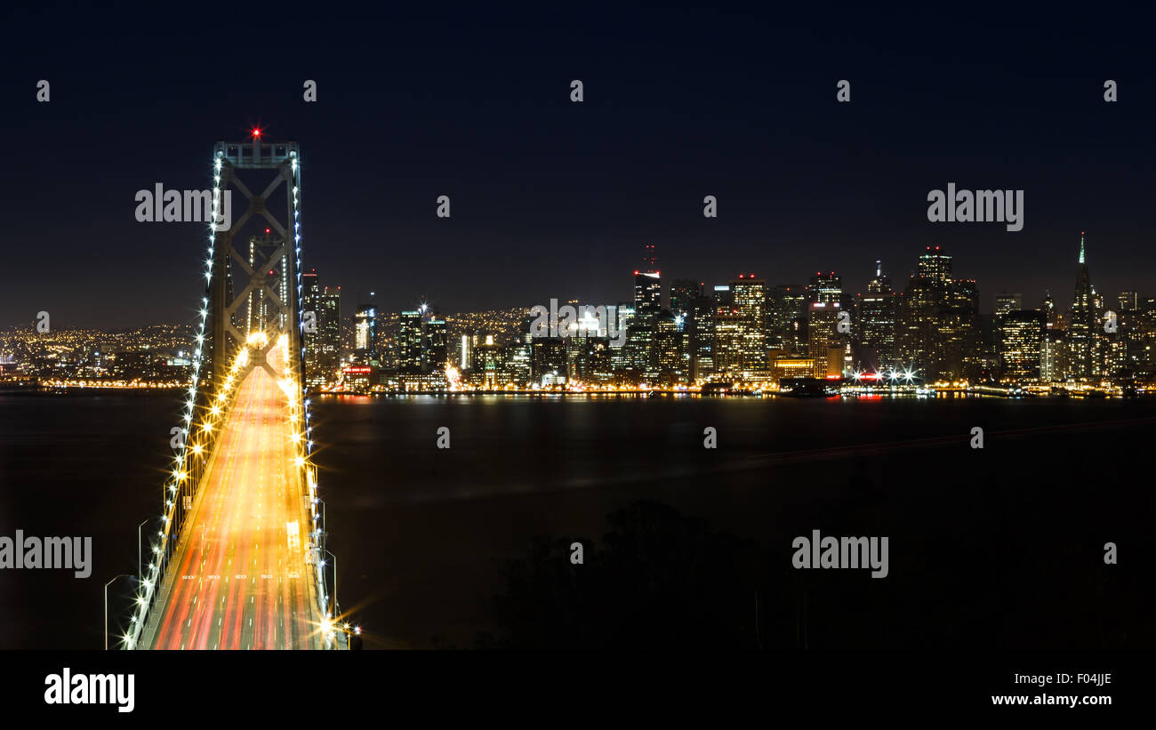 San Francisco bay bridge and skyline at night Stock Photo