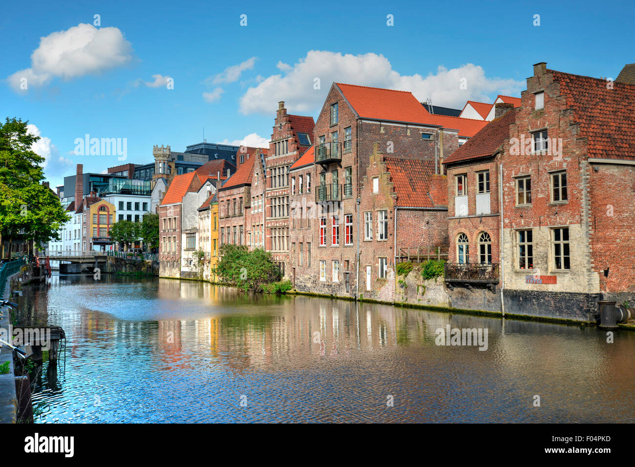 Beautiful view of ancient buildings with a blue sky and white clouds in Gent, Belgium Stock Photo
