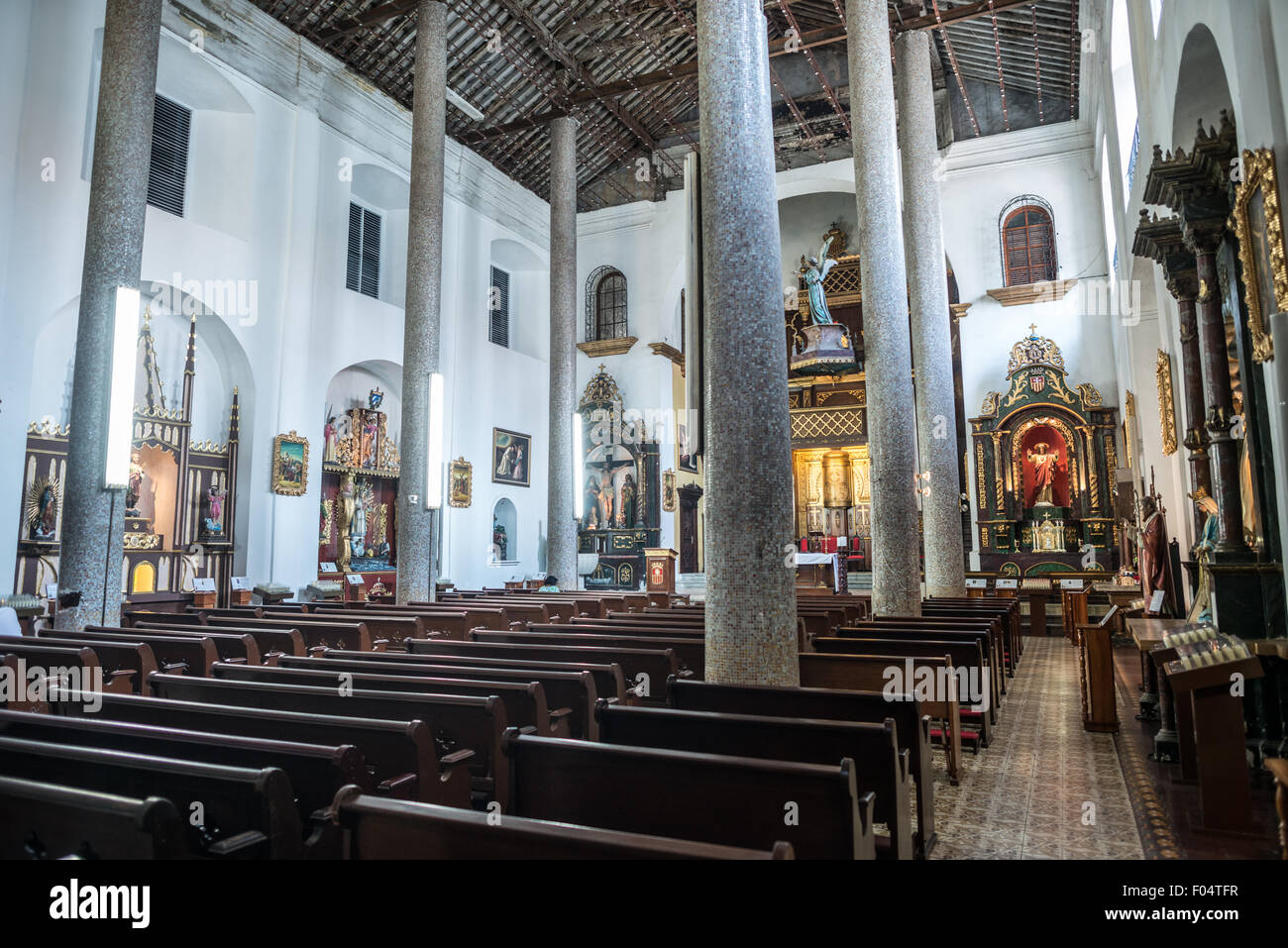 PANAMA CITY, Panama--Dating back to 1680, La Iglesia de la Merced stands in the heart of Casco Viejo, the historic old town of Panama City. Its interior is lavishly decorated with statues and religious art. Stock Photo