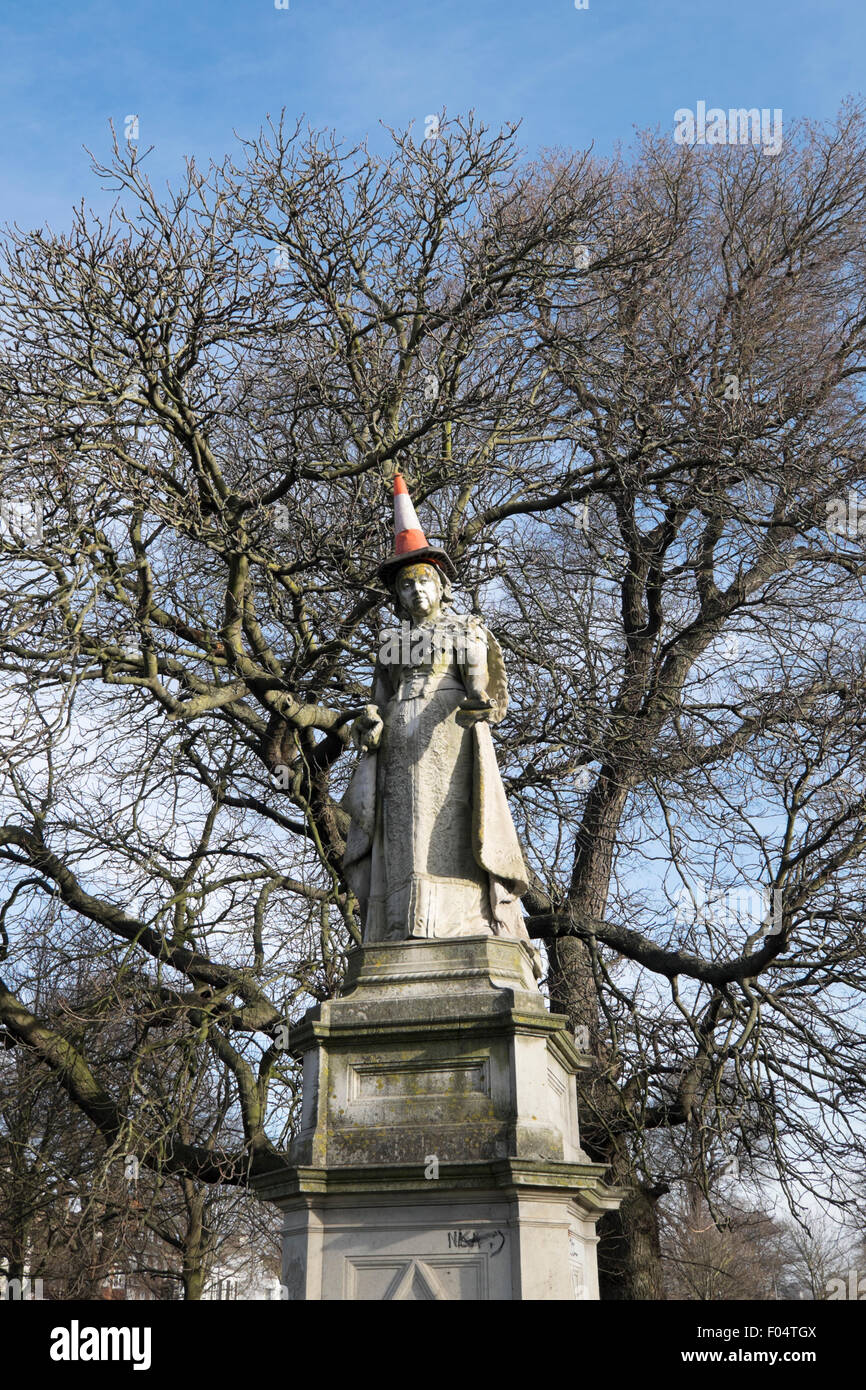 Statue of Queen Victoria with traffic cone on head Stock Photo Alamy
