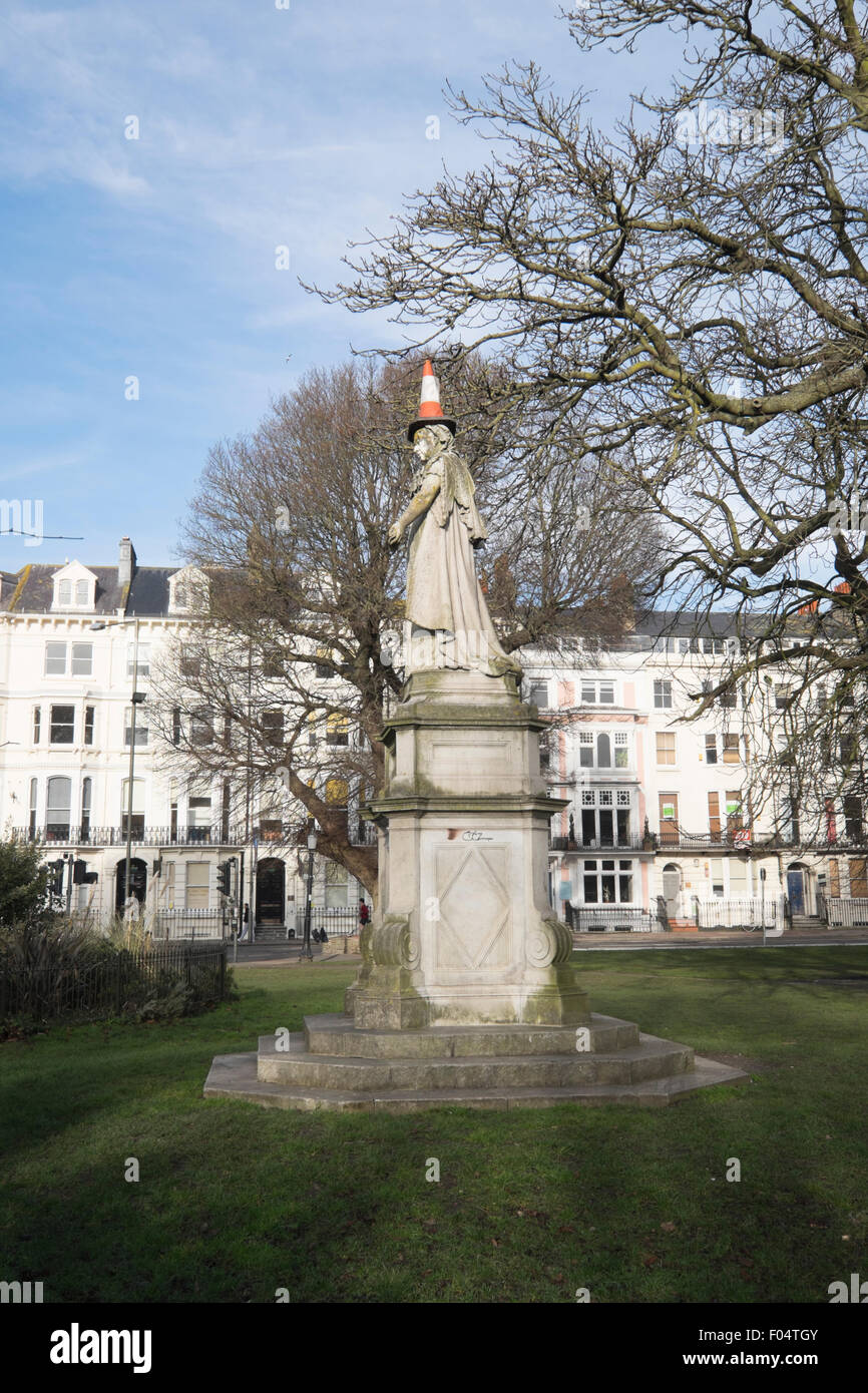 Statue of Queen Victoria with traffic cone on head Stock Photo Alamy