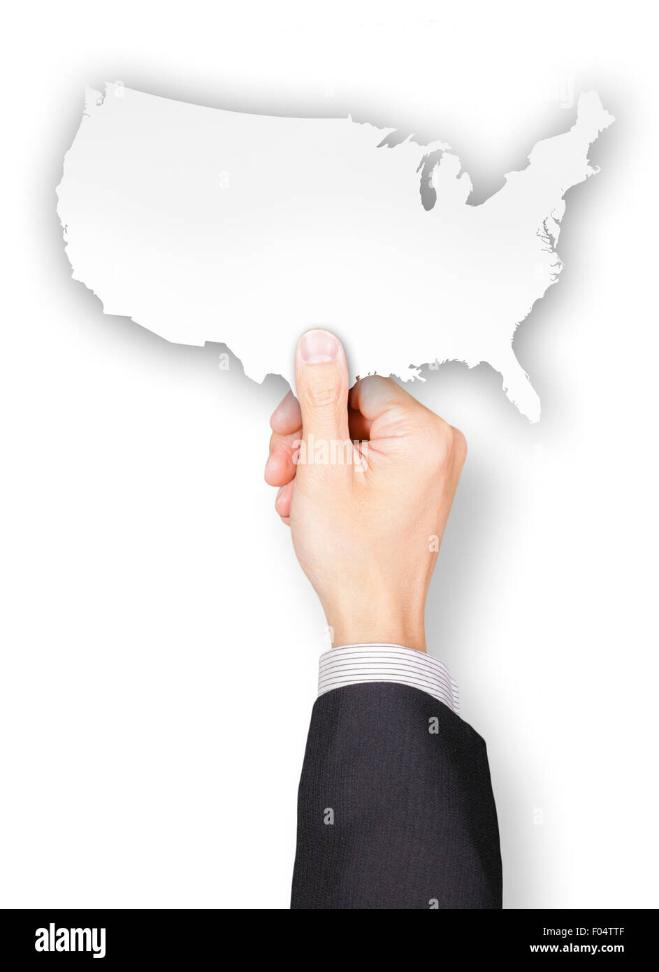 Hand of businessman holding USA shaped paper Stock Photo