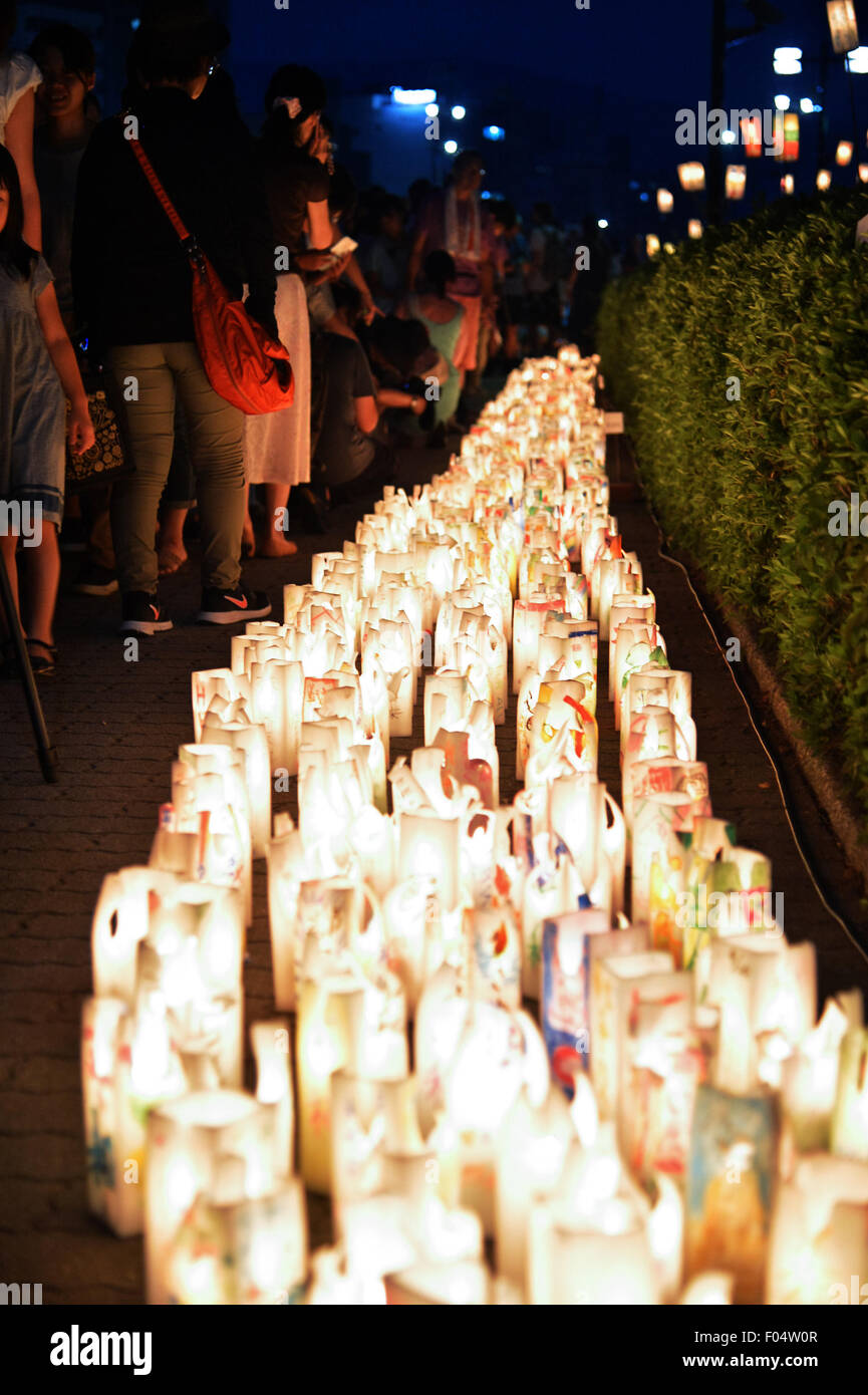 Hiroshima, Japan. 6th August, 2015. Candles with message are seen