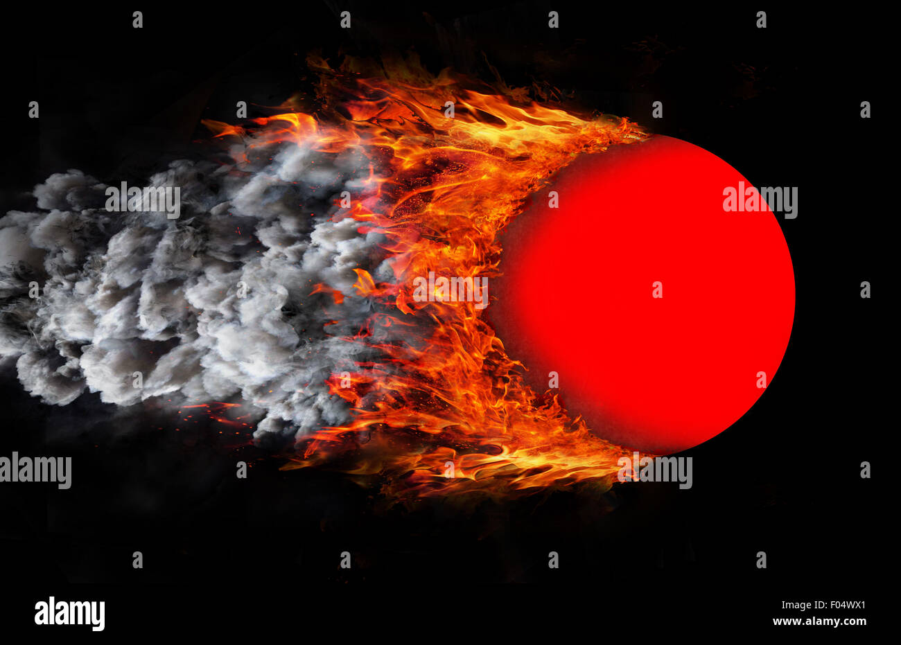 Concept of speed - Ball with a trail of fire and smoke - red Stock Photo