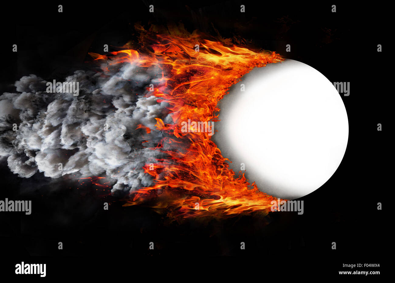 Concept of speed - Ball with a trail of fire and smoke - white Stock Photo
