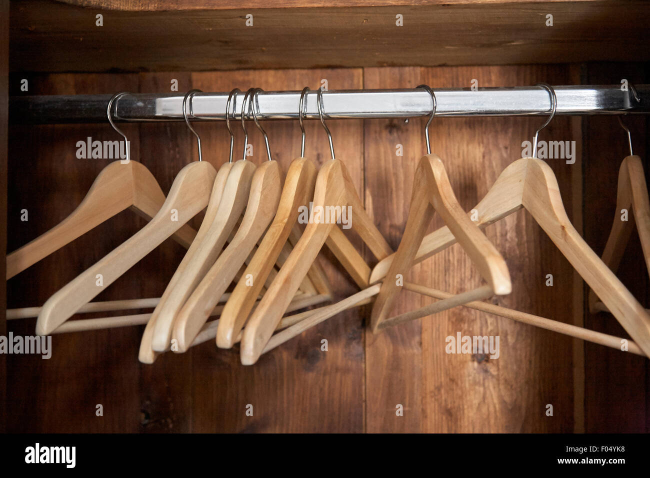 Womens Clothes On Wood Hangers On Rack Stock Photo, Picture and Royalty  Free Image. Image 92215208.