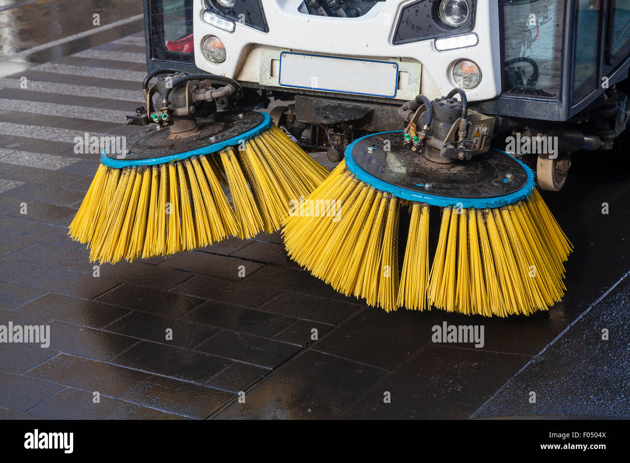 Brushes of street sweeper Stock Photo Alamy