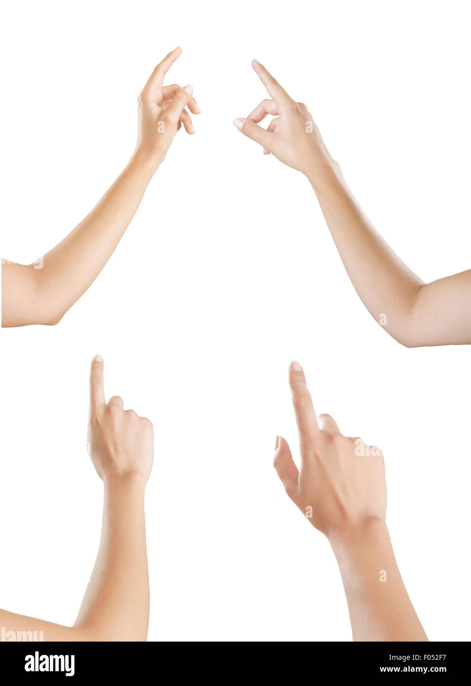 many women's hands pointing with his index finger upwards, isolated white background Stock Photo