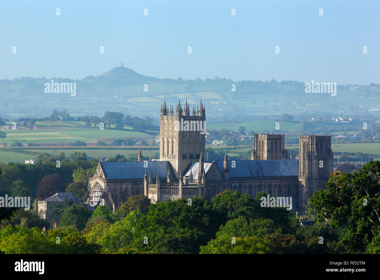 Wells Cathedral with Glastonbury Tor in the distance. Somerset. England. UK. Stock Photo
