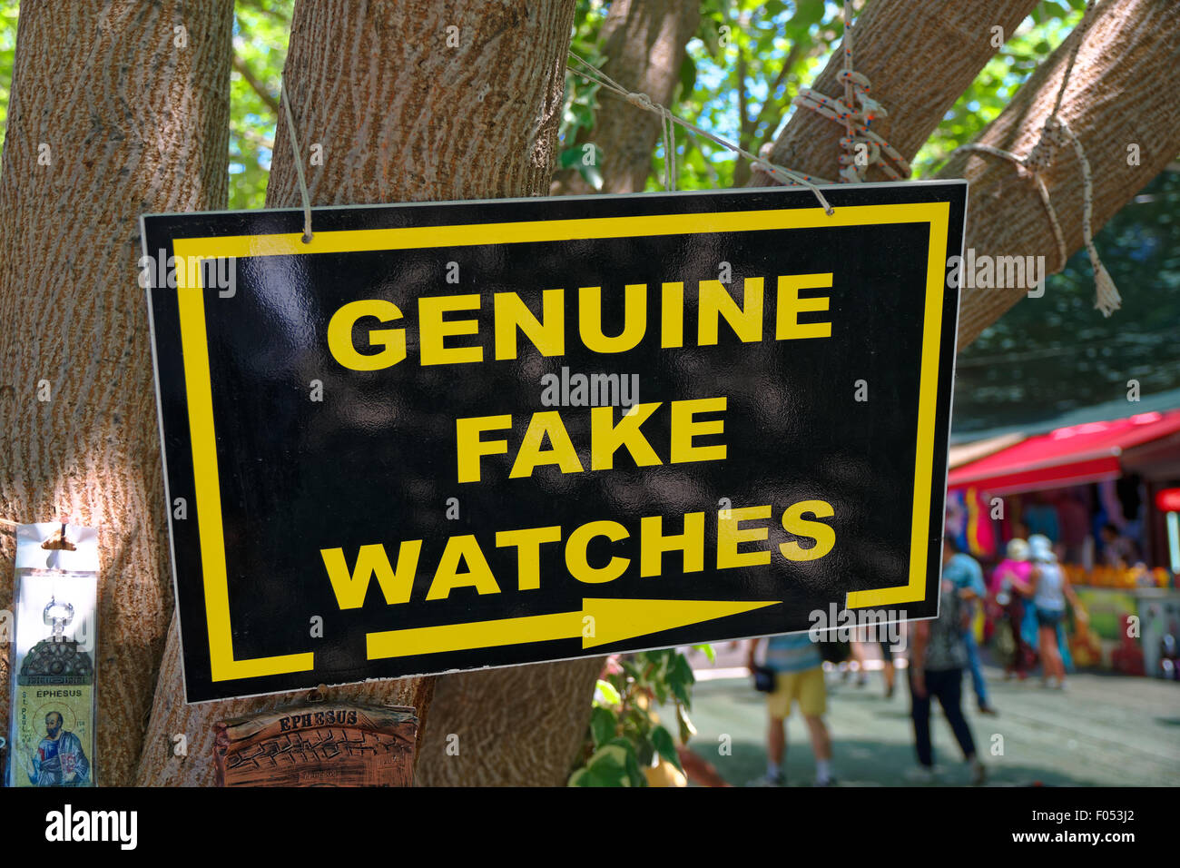 Genuine Fake Watches sign in a Turkish market. Stock Photo
