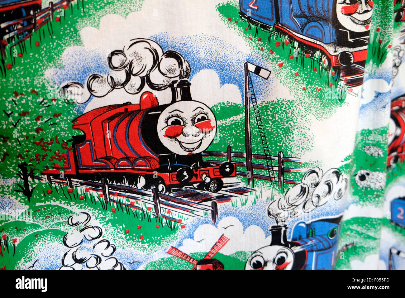 Children's illustration of James, one of the Thomas the Tank Engine steam train friends printed on fabric UK   KATHY DEWITT Stock Photo