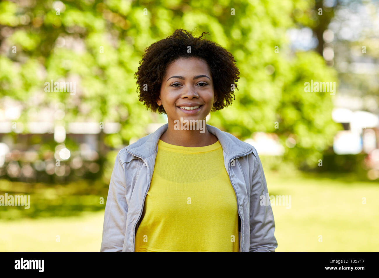 happy african american young woman in summer park Stock Photo - Alamy