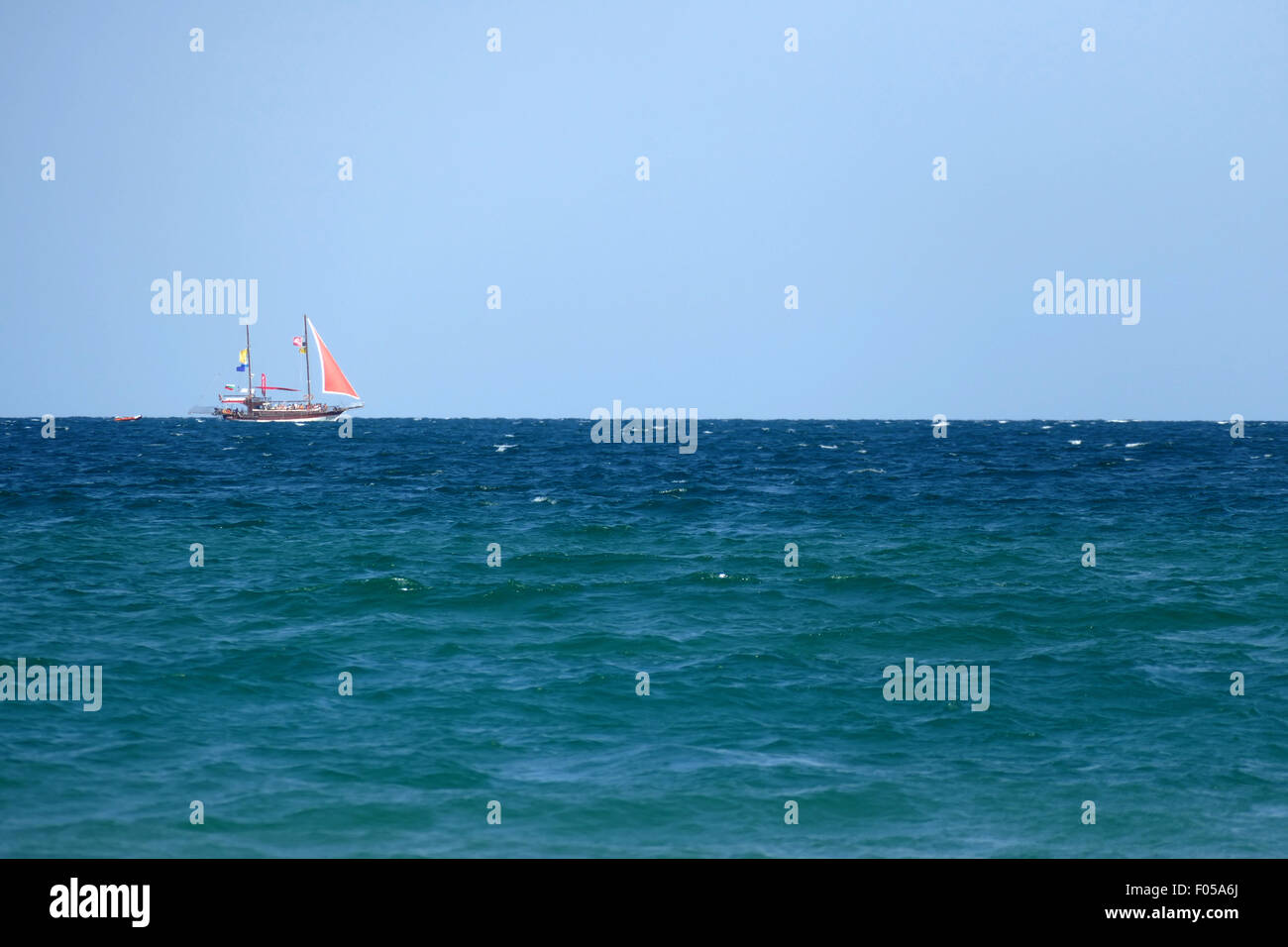 Sailboat on the horizon. Stock Photo