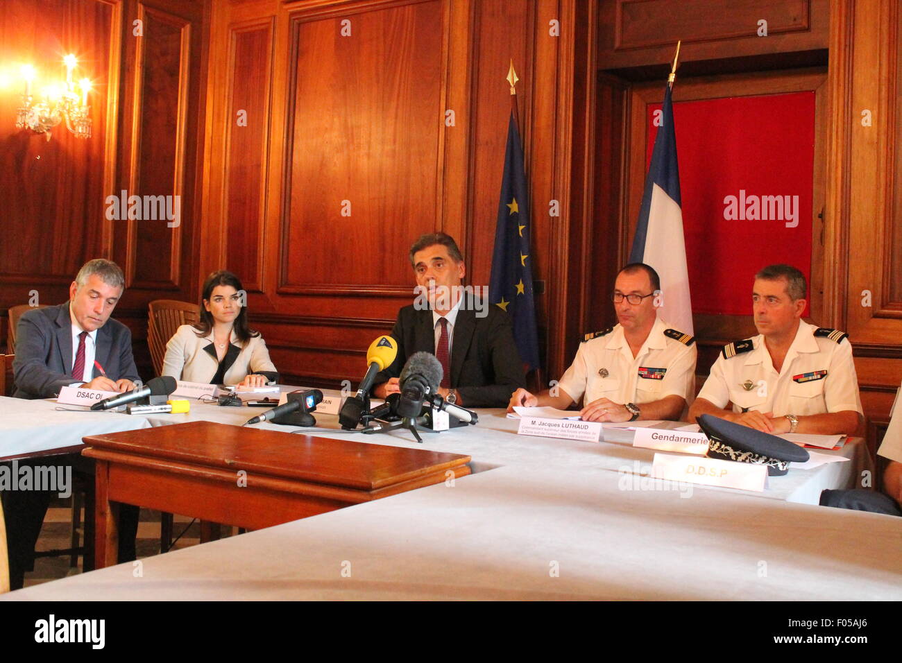 Reunion Island, France. 7th Aug, 2015. Dominique Sorain (C), La Reunion's administrator, talks to media during a press conference on search plan for MH370 debris in Reunion Island, on Aug. 7, 2015. Authority of France's oversea island La Reunion has confirmed the plan of search for more MH370 parts and said the search will last for at least one week. Credit:  Romain Latournerie/Xinhua/Alamy Live News Stock Photo