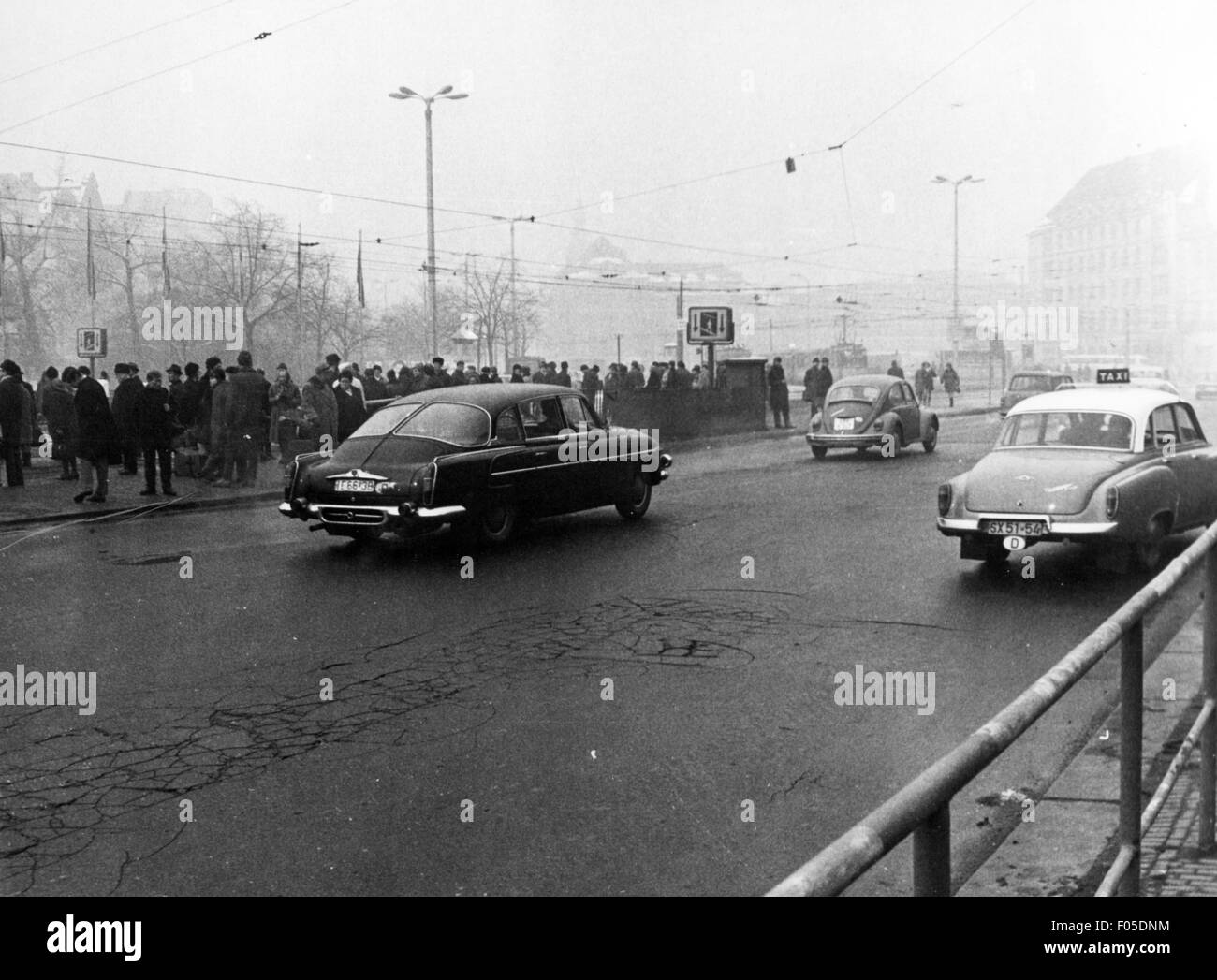 Germany, Leipzig, squares, Platz der Republik (Willy-Brandt-Platz), March 1970, Willy Brandt square, transport, transportation, cars, car, Skoda 1201, Volkswagen, VW beetle, Wartburg 312, taxi, taxicab, cab, taxicabs, cabs, central station, main station, main-station, main stations, main-stations, central stations, central terminal, central terminals, road traffic, crowd, crowds, crowds of people, 1970s, 70s, 20th century, East-Germany, GDR, DDR, East Germany, Eastern Germany, Saxony, Central Europe, squares, square, historic, historical, Additional-Rights-Clearences-Not Available Stock Photo