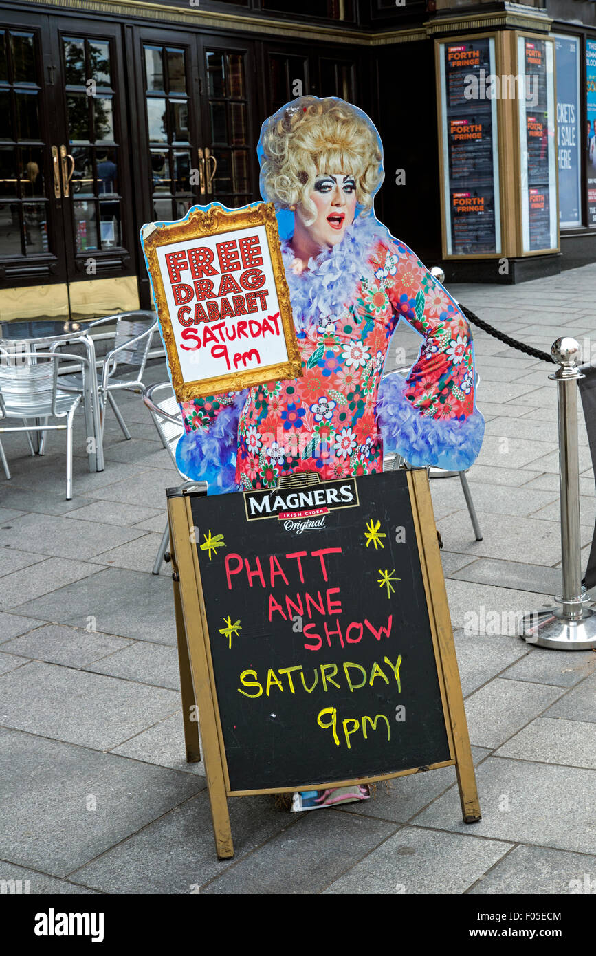 An A-board and cutout figure advertising a Free Drag Cabaret in Edinburgh, Scotland, UK Stock Photo