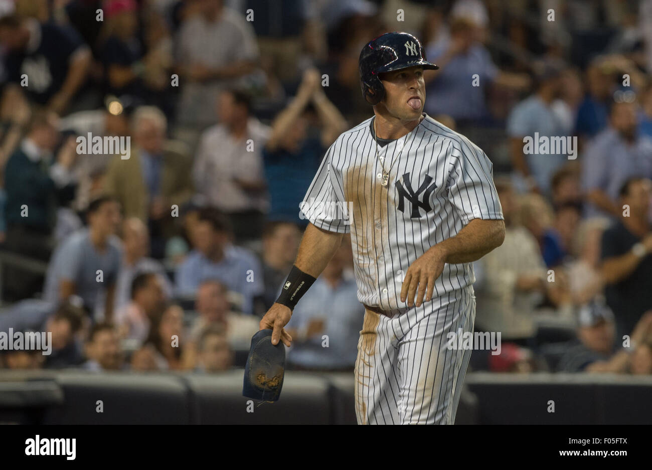 New York, New York, USA. 6th Aug, 2015. Yankees' BRETT GARDNER scores as Alex Rodriguez doubles to left in the 3rd inning, New York Yankees vs. Boston Red Sox, Yankee Stadium, Thursday, August 6, 2015. Credit:  Bryan Smith/ZUMA Wire/Alamy Live News Stock Photo