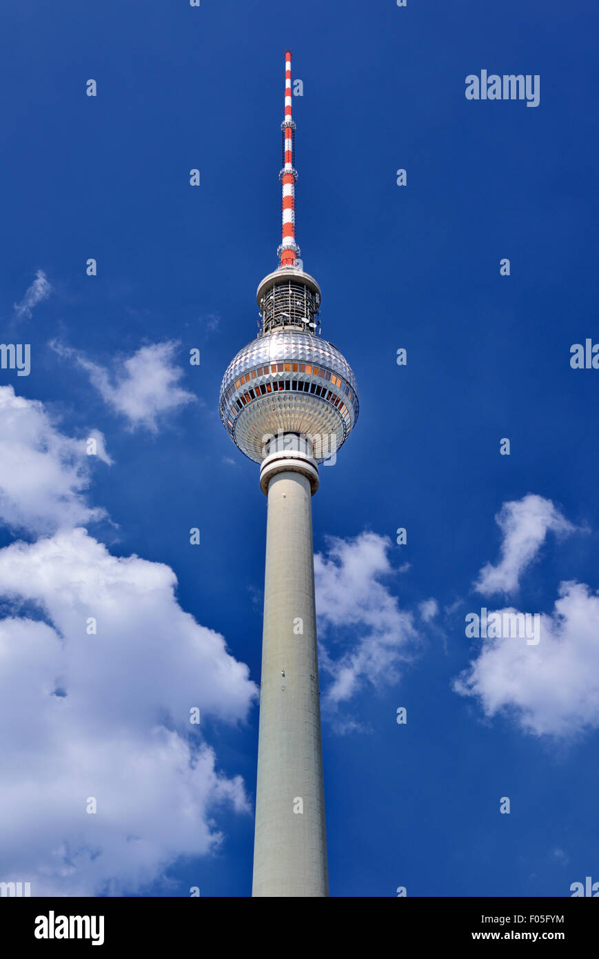 Germany, Berlin: TV Tower of Berlin with baby blue sky and fair weather clouds in the background Stock Photo