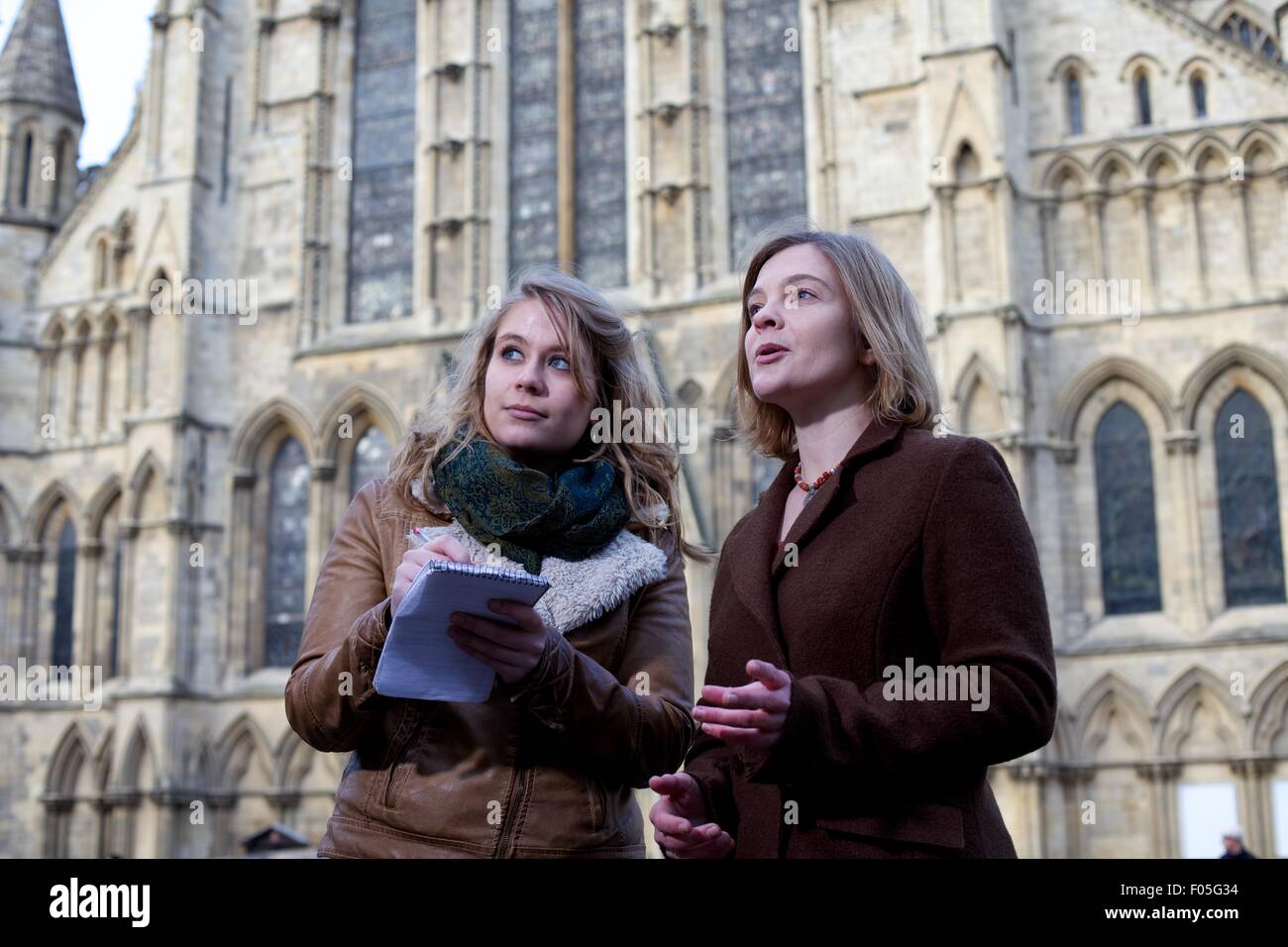 archeology teacher and student studying old buildings in York Stock Photo