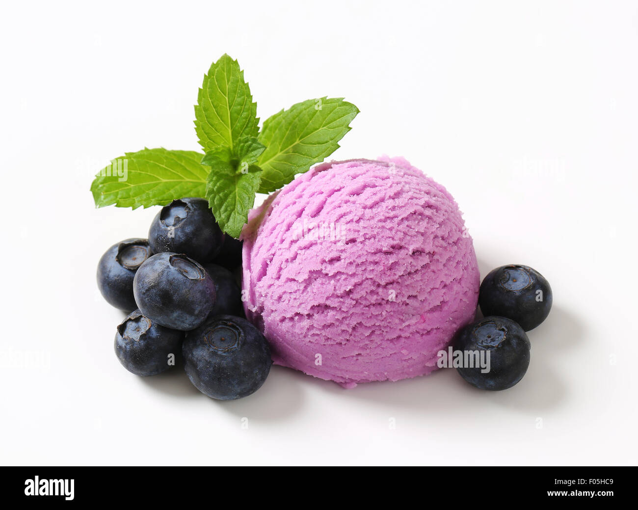 Scoop of blueberry ice cream with fresh berries Stock Photo