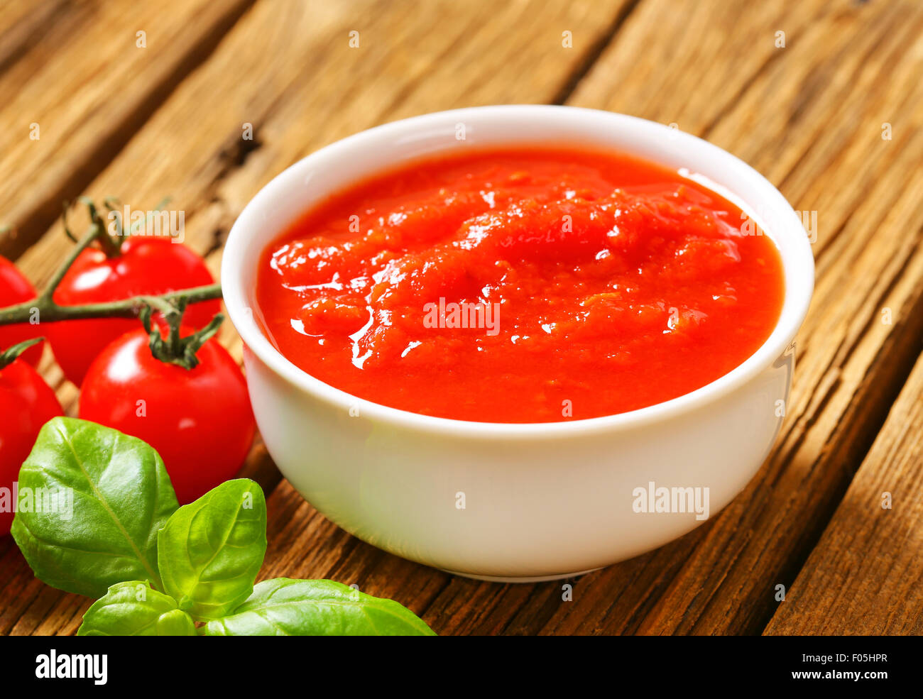 Bowl of thick tomato passata Stock Photo