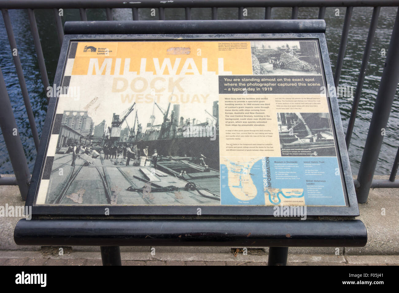 An education sign board that introduces the history of Millwall Dock is on display at Millwall Inner Dock near Canary Wharf. Stock Photo
