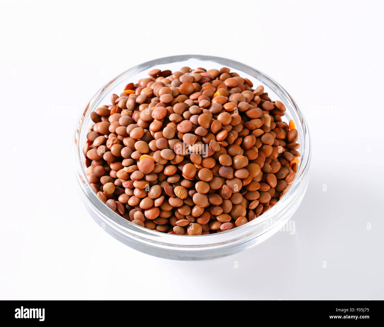 Bowl of whole red lentils Stock Photo - Alamy