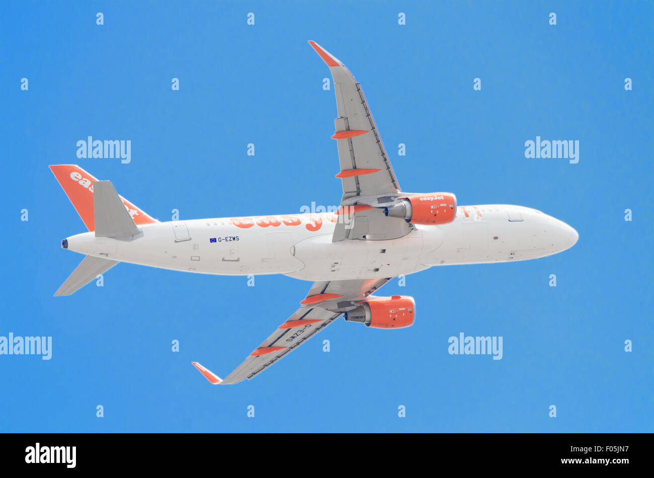TENERIFE, SPAIN - JUNE 3: Scenic view of an Easy Jet Airbus A320-200 taking off from Tenerife south airport on a sunny day. Stock Photo