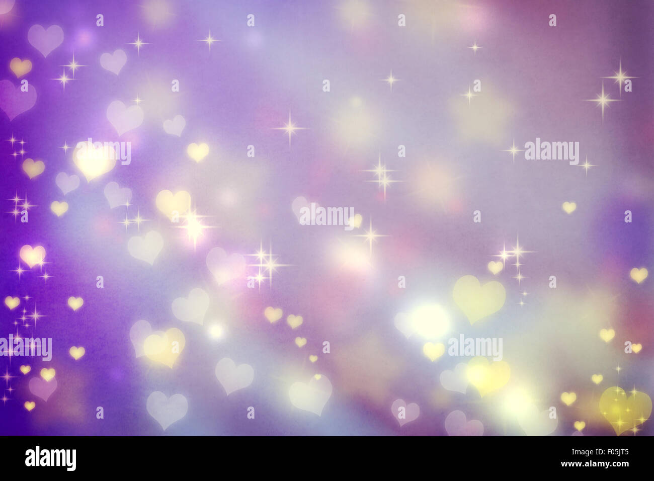 Golden small hearts on purple background with stars Stock Photo