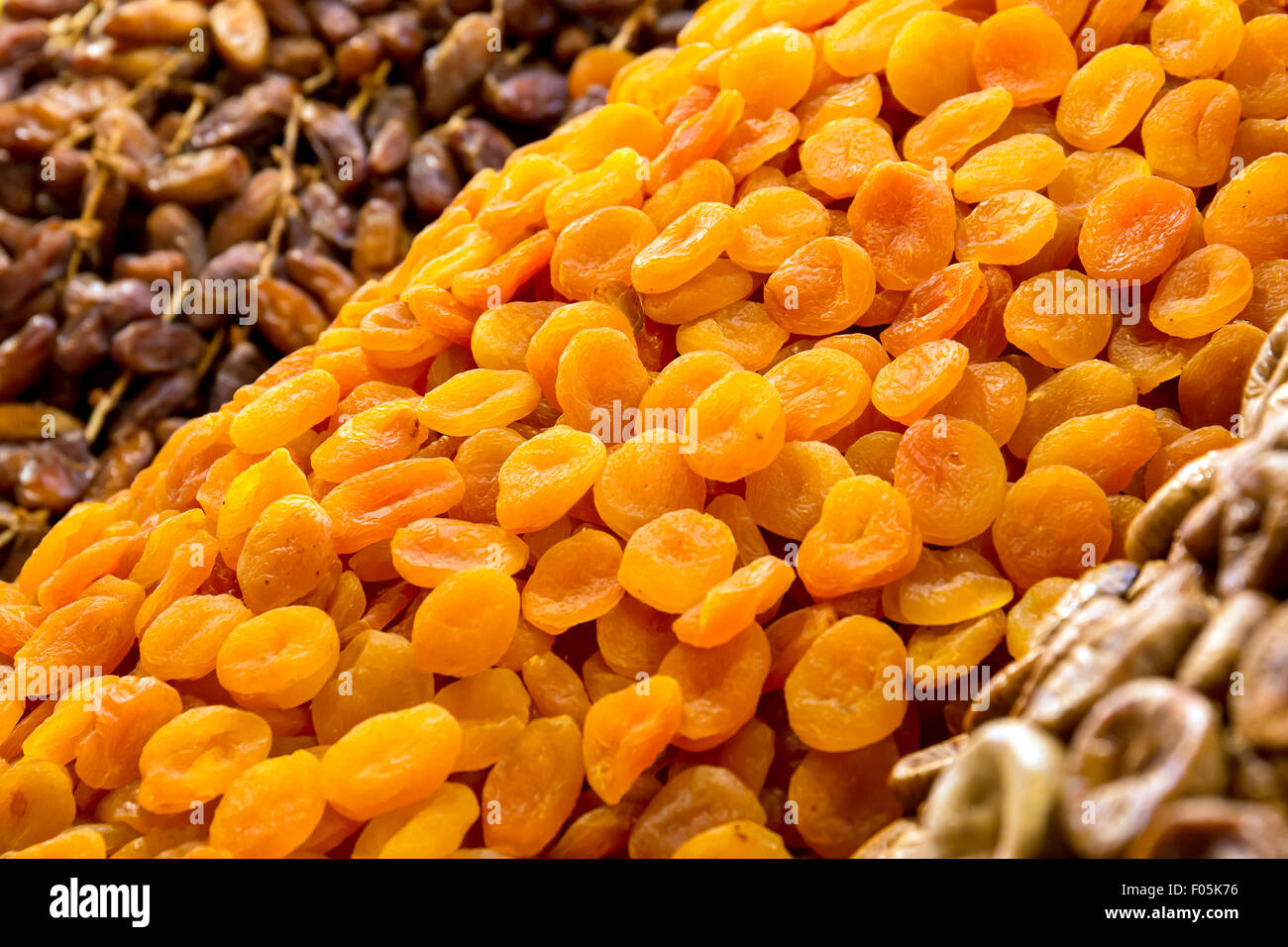 Dried fruits: apricots and dates at moroccan market in Marrakesh Stock Photo