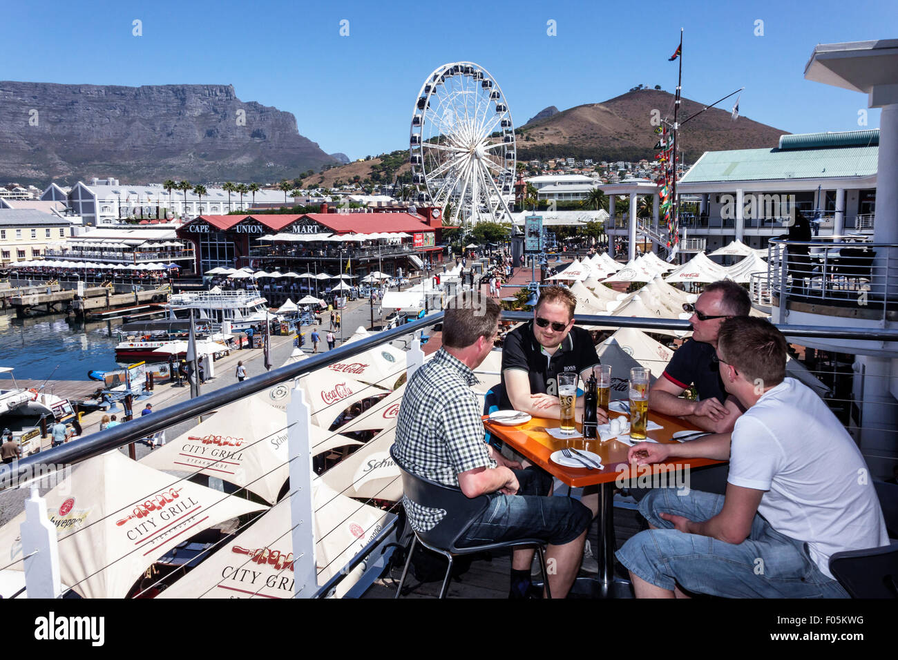 Cape Town South Africa,V & A Victoria Alfred Waterfront,Table Bay Harbour,harbor,Table Mountain,Cape Wheel,Ferris,Cape Union Mart,restaurant restauran Stock Photo