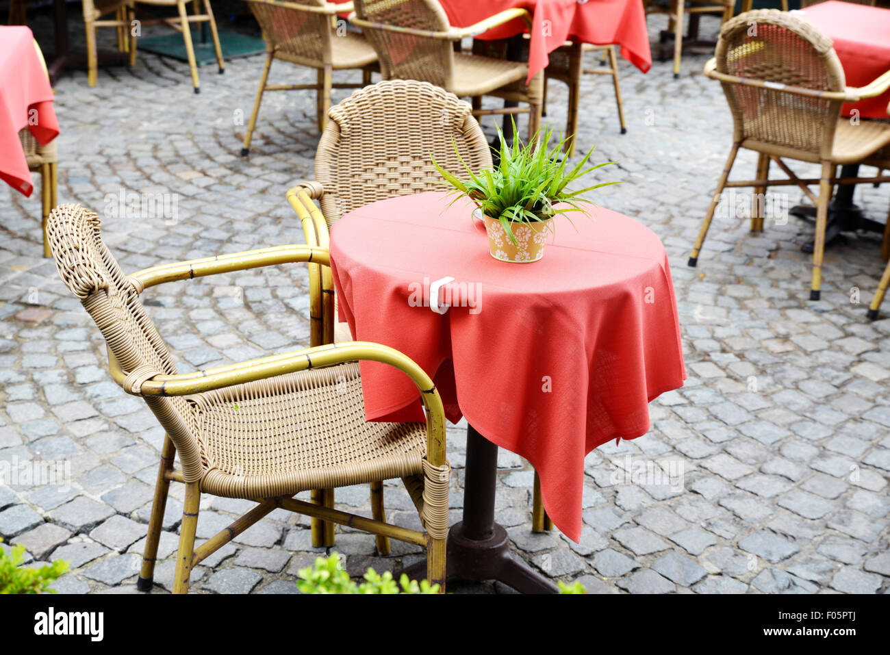 Lonely table in an open restaurant terrace in Europe Stock Photo