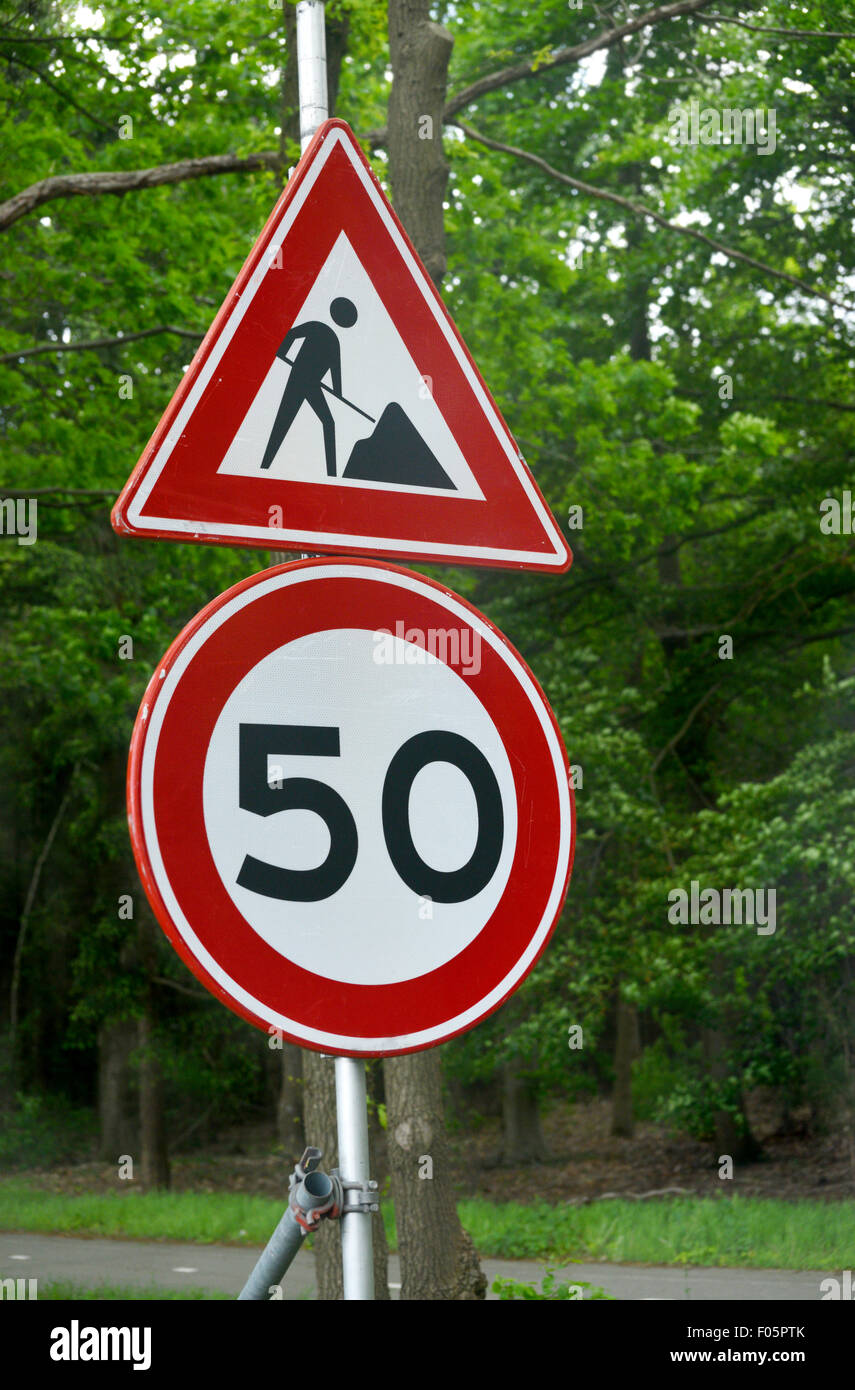 Men at work sign in the countryside in north Belgium Stock Photo