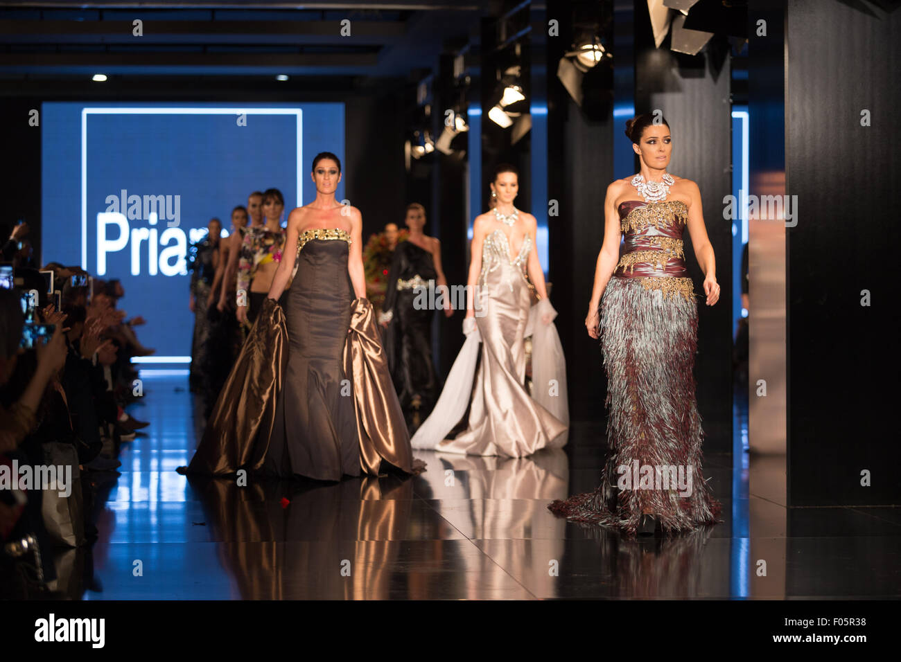 ISTANBUL, TURKEY - NOVEMBER 21, 2014: Models showcase the latest creations by Priamos in Fashionist fashion fair Stock Photo