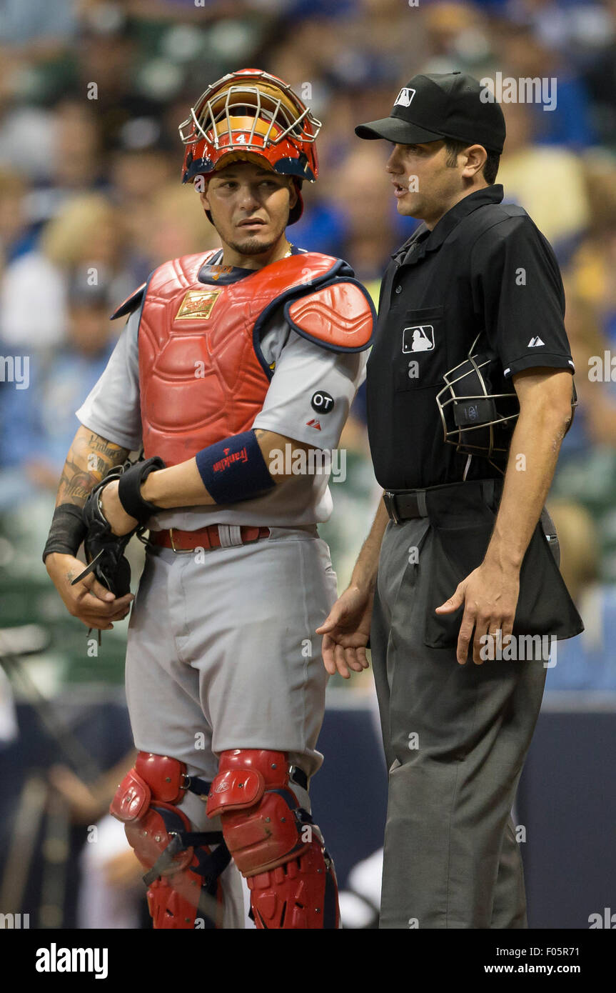 Milwaukee, WI, USA. 07th Aug, 2015. St. Louis Cardinals catcher Yadier Molina #4 talks with home plate umpire John Tumpane during a replay in the Major League Baseball game between the Milwaukee Brewers and the St. Louis Cardinals at Miller Park in Milwaukee, WI. John Fisher/CSM/Alamy Live News Stock Photo