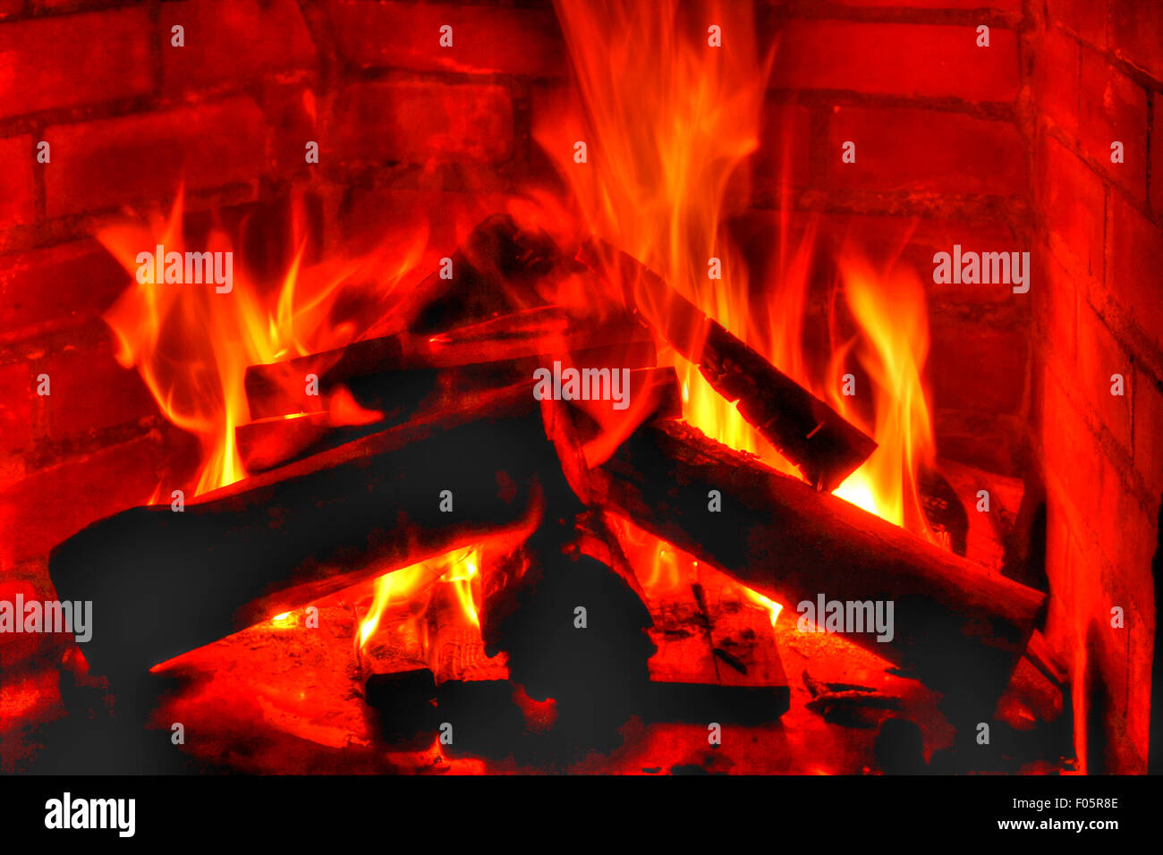 Close up of a fire burning in a fireplace Stock Photo