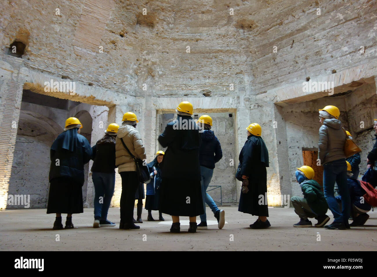 Visitors in the octogonal room of the Domus Aurea, the famous  Nero palace on the slopes of the Esquiline hill Stock Photo