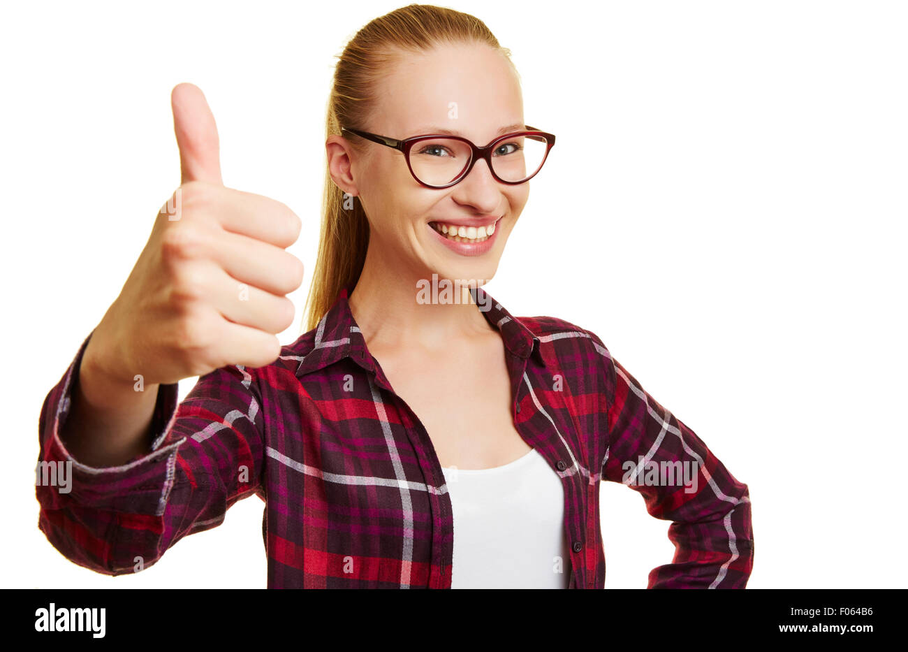 Happy female smiling student holding her thumbs up Stock Photo - Alamy