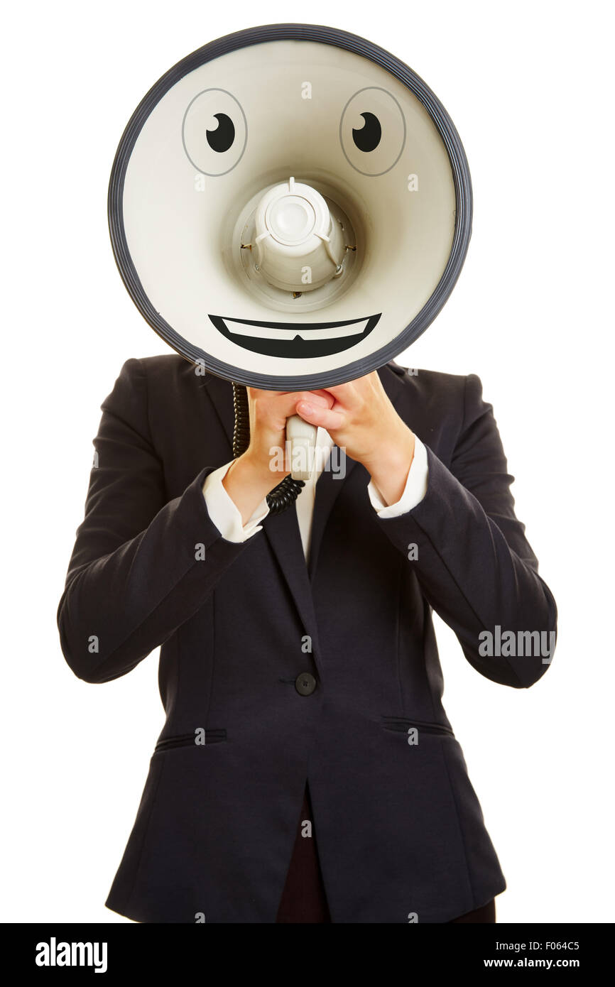 Smiley face on a megaphone in front of a businesswoman Stock Photo