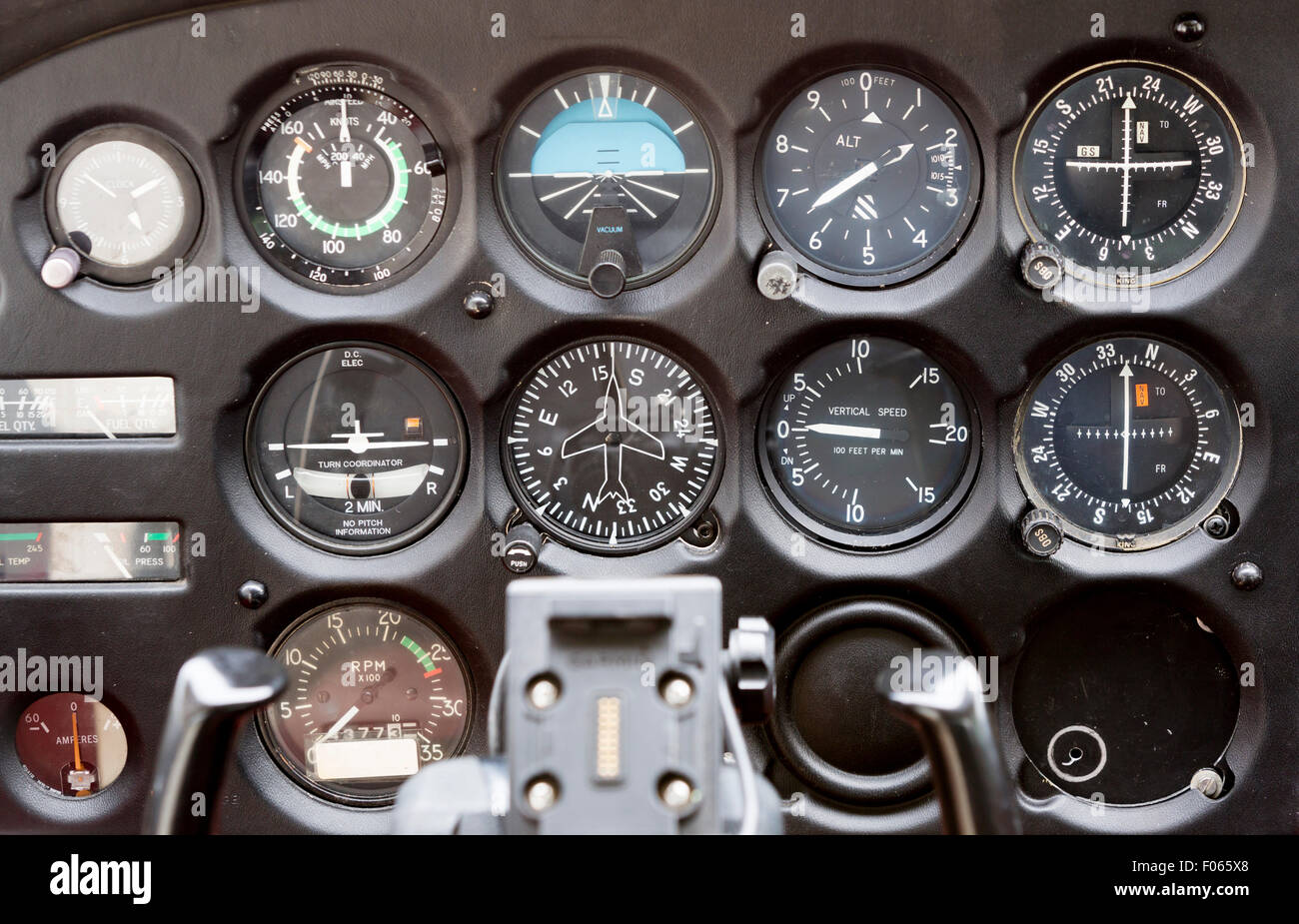 Flight desk control panel on a two-seated old small airplane. Stock Photo