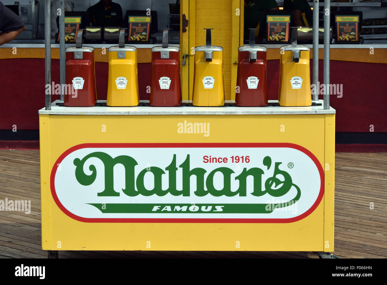Condiments outside of Nathan's on the Coney Island boardwalk in Brooklyn, New York Stock Photo
