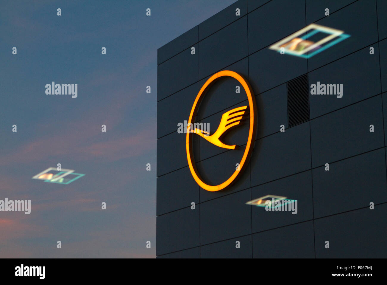 The Lufthansa logo on an airport building. Stock Photo