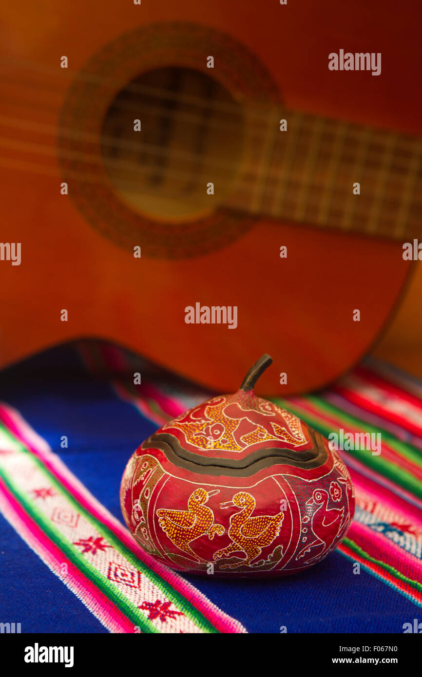 Latin American still life with guitar and painted pumpkin Stock Photo