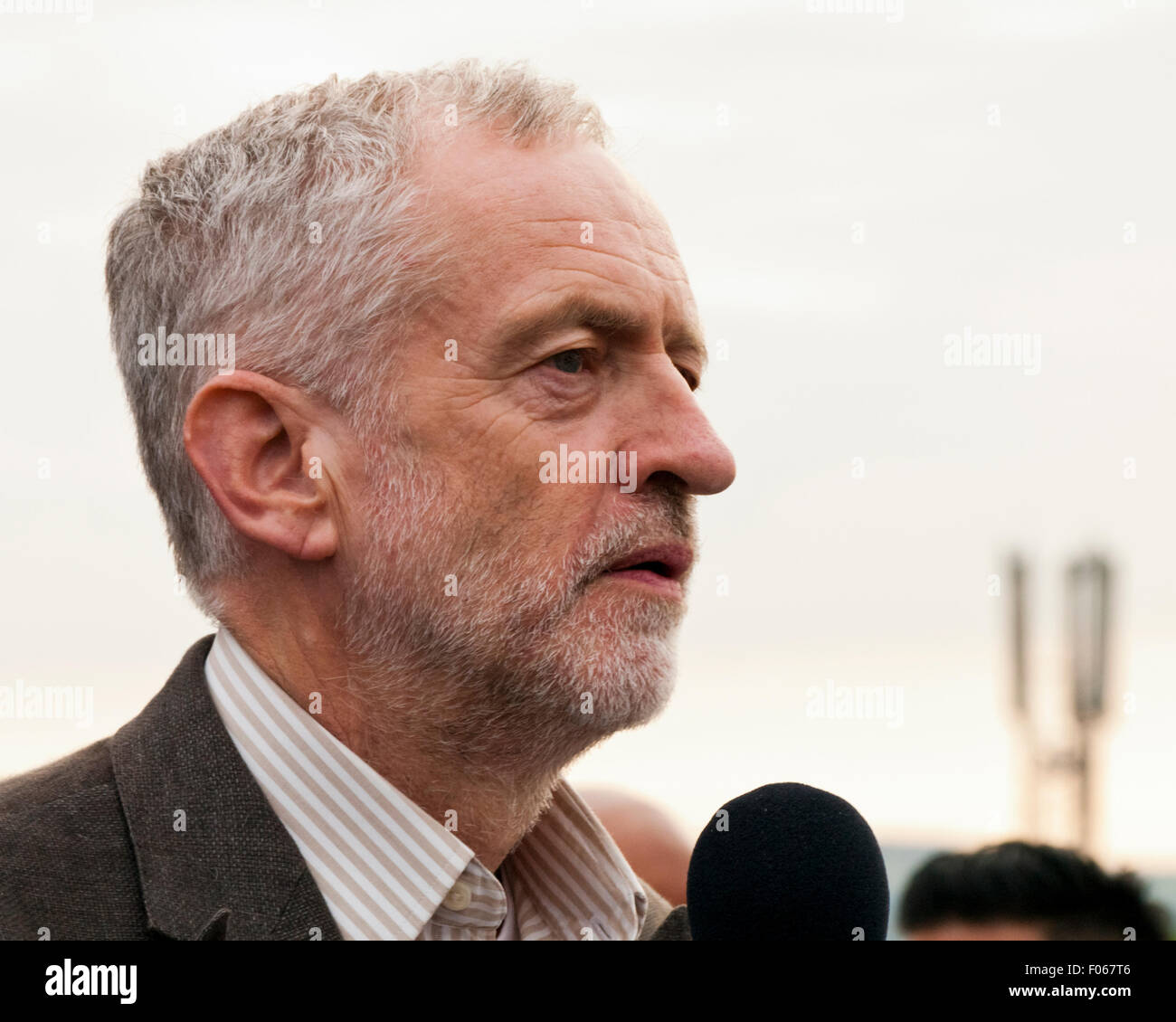 Bradford, Yorkshire, UK. 7th Aug, 2015. Jeremy Corbyn begins his speech in his bid to become the next British Labour Party Leader.  The rally was held at the Karmand Community Centre cricket ground on Friday 7th August 2015, Bradford , West Yorkshire, UK Credit:  Graham Hardy/Alamy Live News Stock Photo