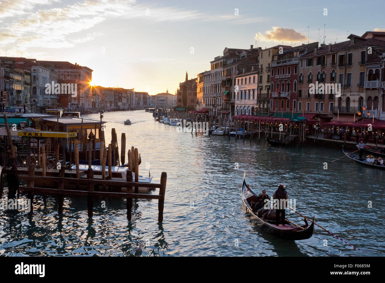 Gondola on the Grand Canal in Venice at sunset Stock Photo - Alamy