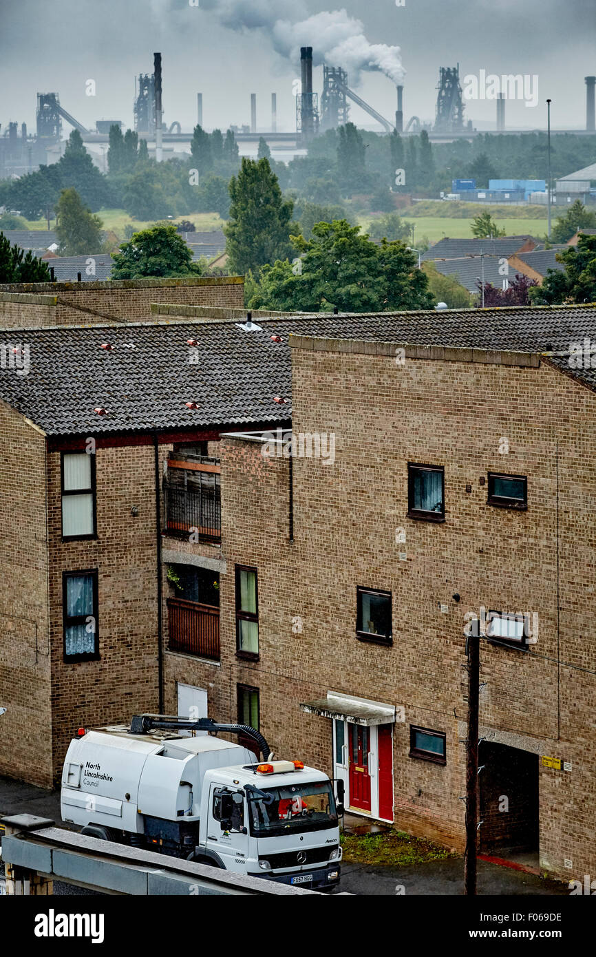 Scunthorpe skyline view showing the  Tata Steel Works over the rooftops North Lincolnshire South Humberside  city  commercial  R Stock Photo