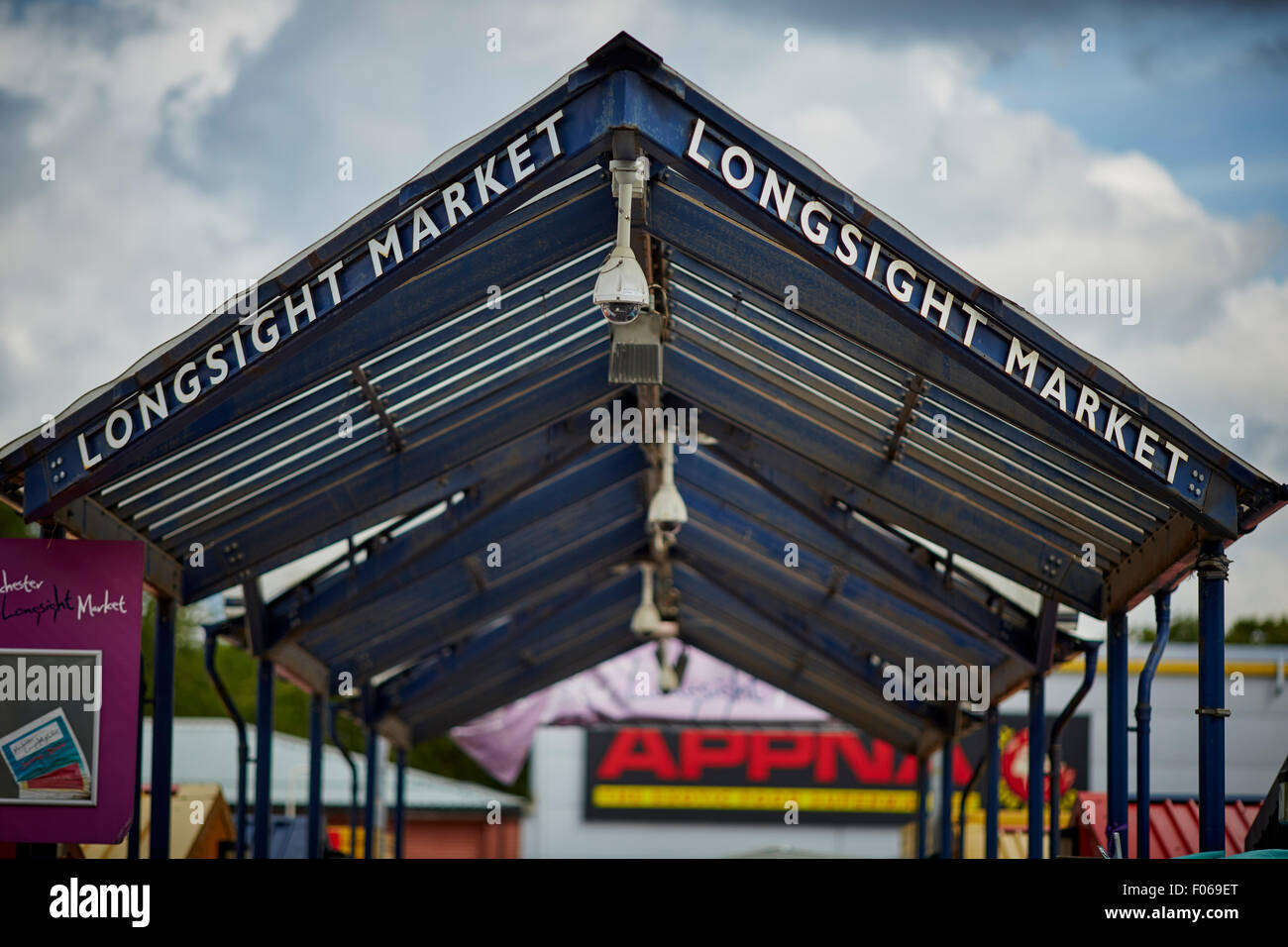 Longsight market in Manchester Uk  Shop shopping shopper store retail supermarket retailer retailers traders trading outlet buyi Stock Photo